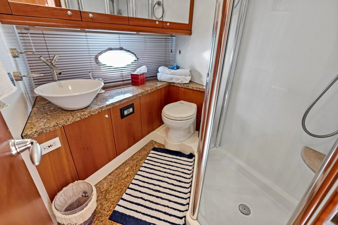 a bathroom with a sink toilet and a bathtub aboard PERSISTENCE Yacht for Sale