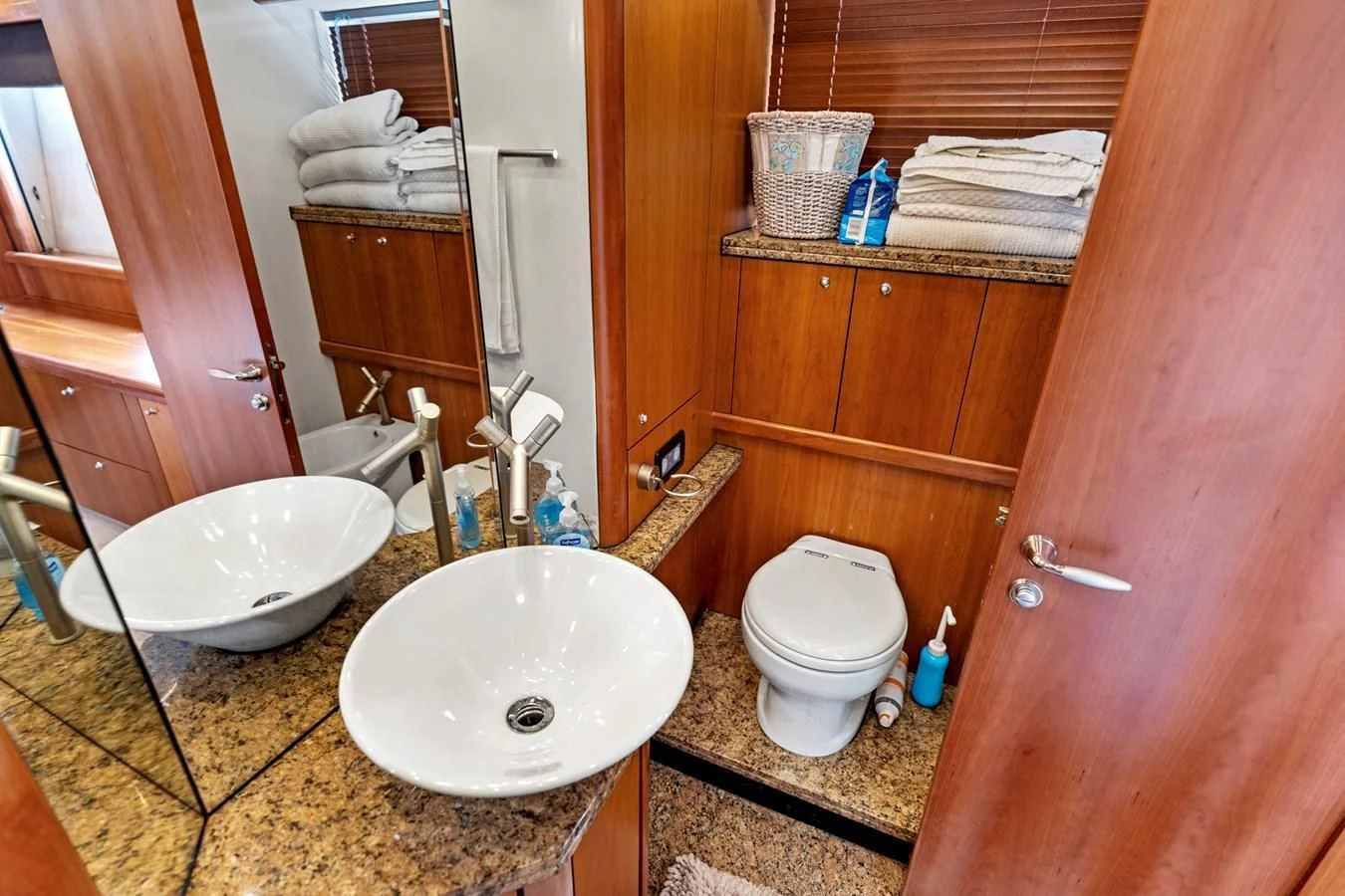a bathroom with a toilet and sink aboard PERSISTENCE Yacht for Sale