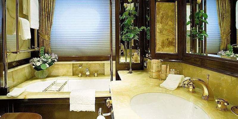 a bathroom with a large bathtub and a sink aboard ROCK & ROLL Yacht for Sale