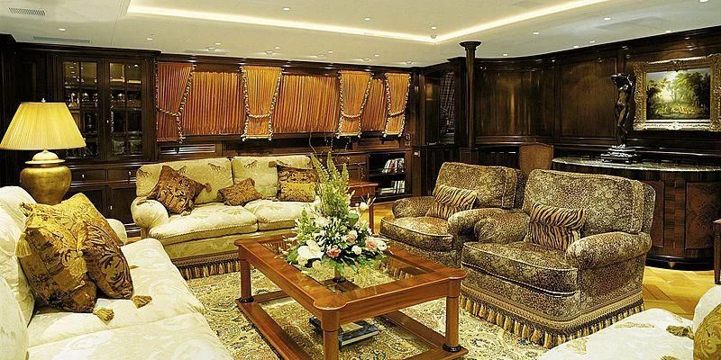 a living room with a fireplace aboard ROCK & ROLL Yacht for Sale