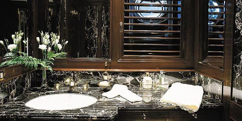a bathroom counter with a sink and a mirror aboard ROCK & ROLL Yacht for Sale