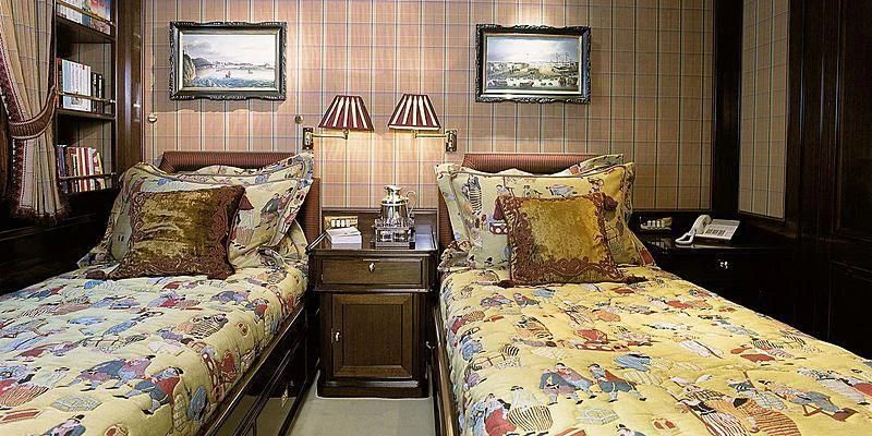 a couple of beds in a room aboard ROCK & ROLL Yacht for Sale