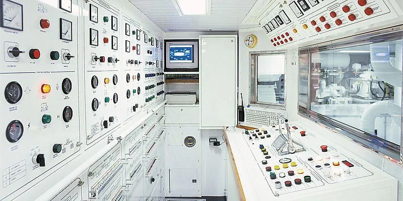 a room with white cabinets and black and white buttons aboard ROCK & ROLL Yacht for Sale