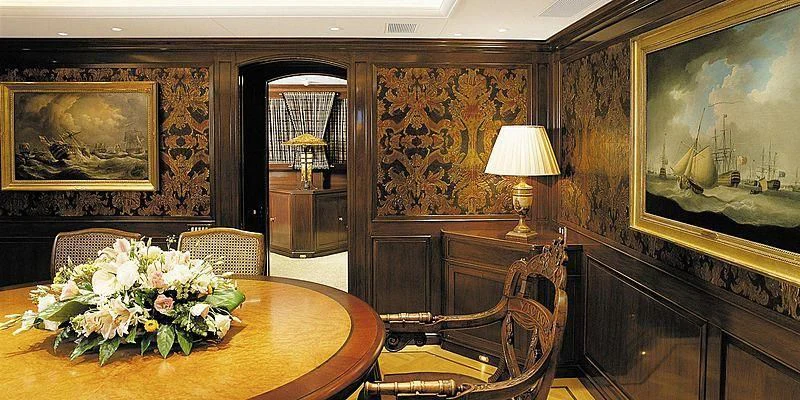 a dining room with a table and chairs aboard ROCK & ROLL Yacht for Sale