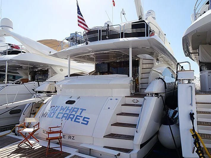 a large white boat with stairs aboard SO WHAT WHO CARES Yacht for Sale