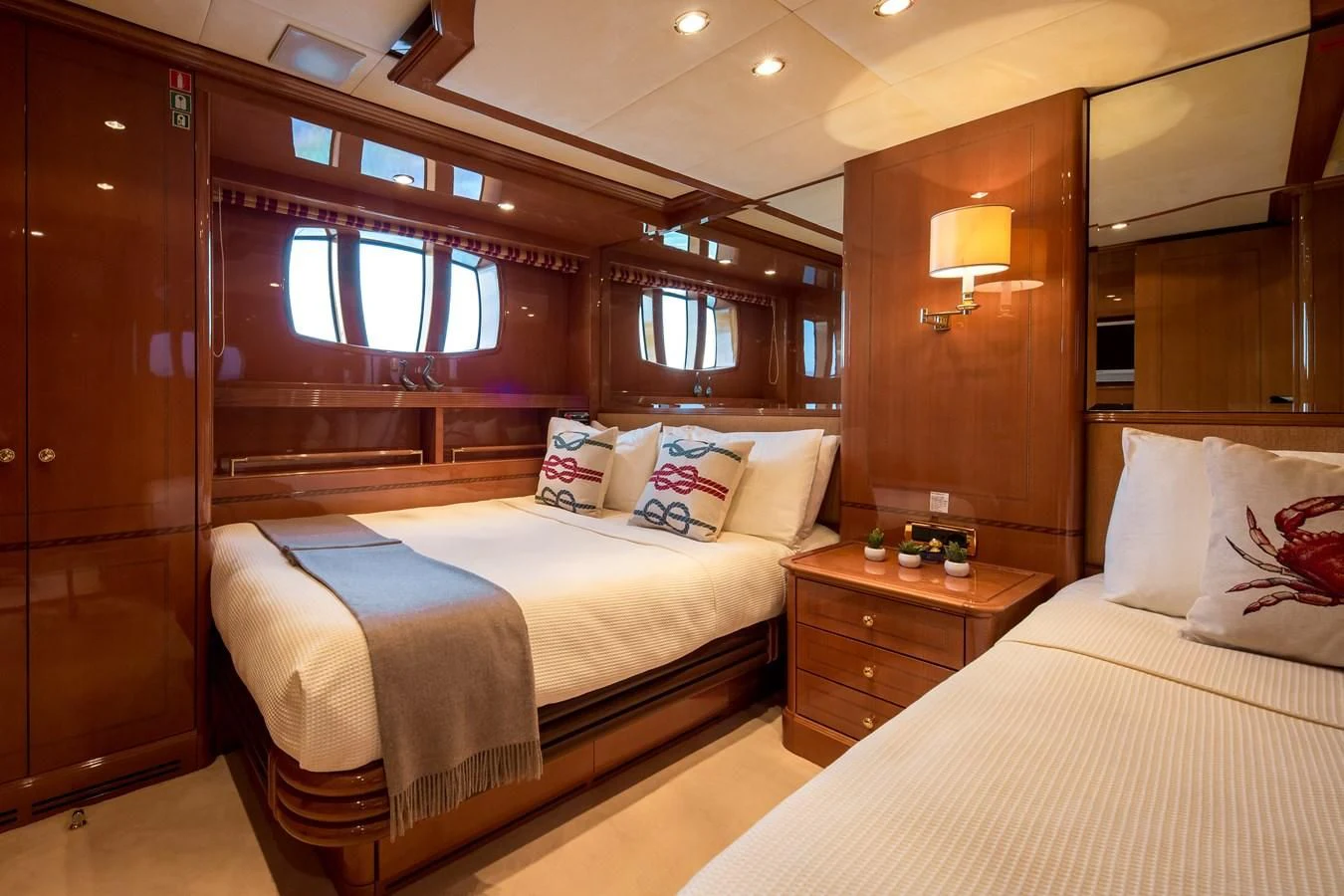a couple of beds in a hotel room aboard REBECCA V Yacht for Sale