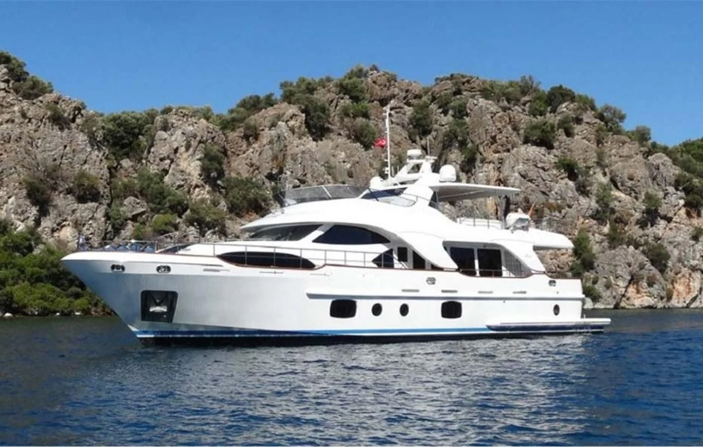 a white yacht on the water aboard REBECCA V Yacht for Sale