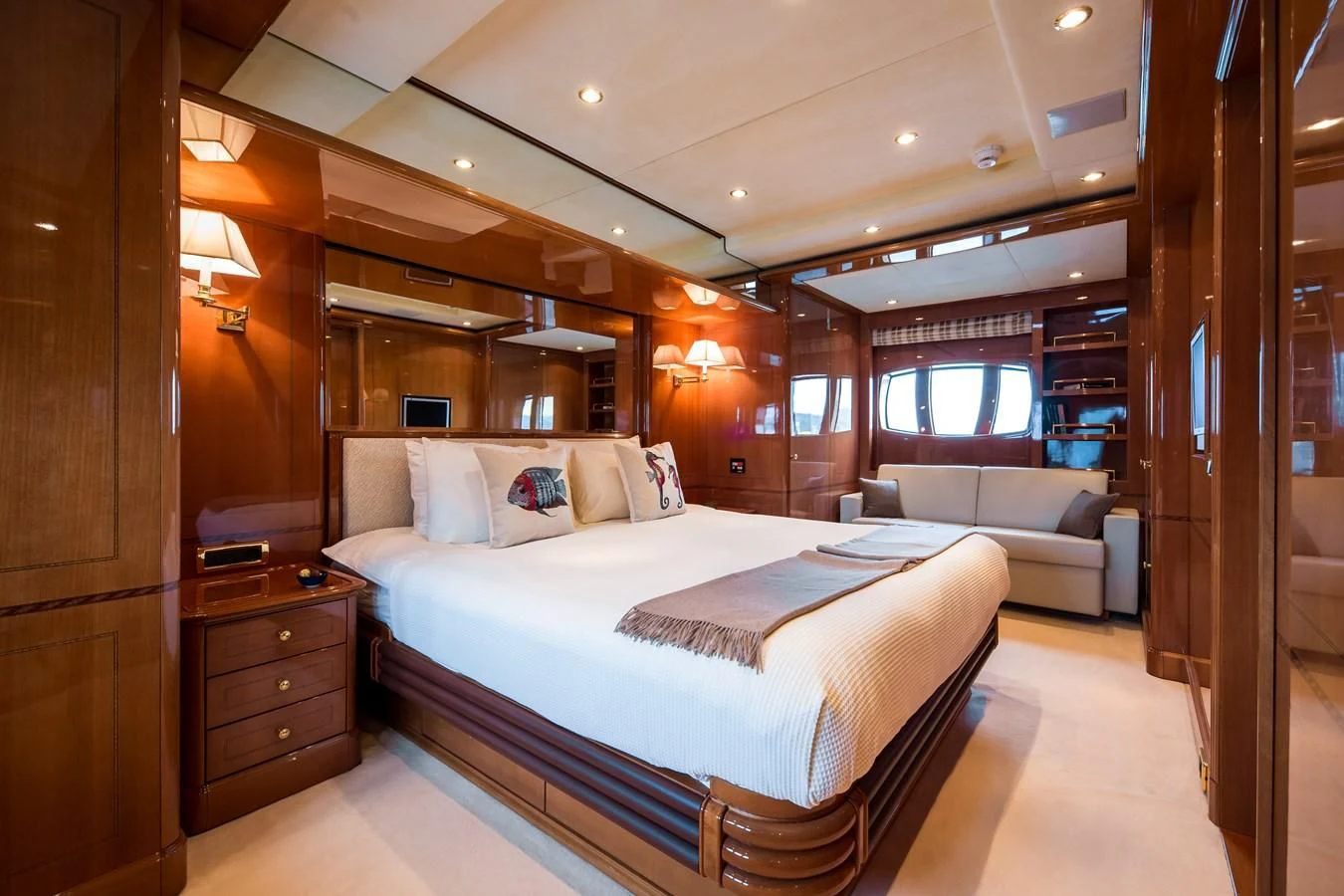 a room with a bed and a couch aboard REBECCA V Yacht for Sale
