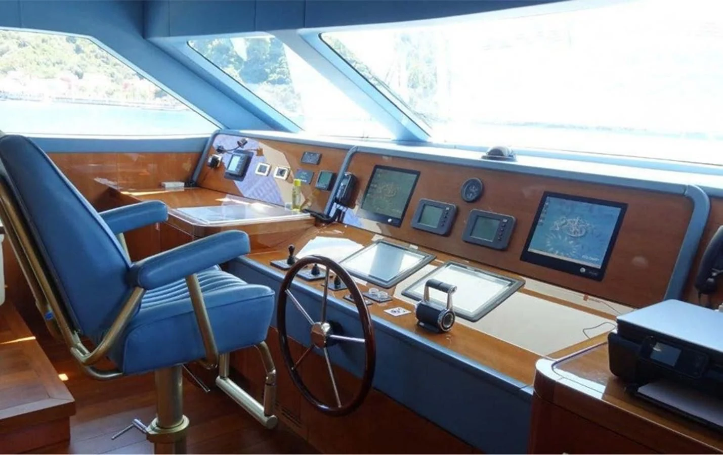 a room with a desk and computer aboard REBECCA V Yacht for Sale