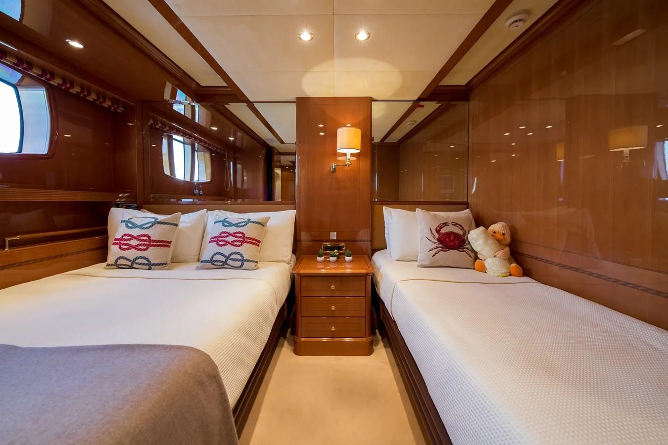 a room with two beds aboard REBECCA V Yacht for Sale