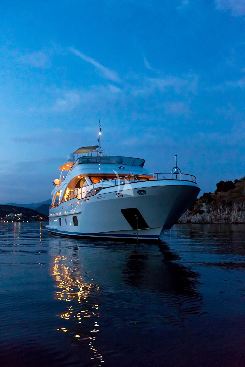 a white boat on the water aboard REBECCA V Yacht for Sale