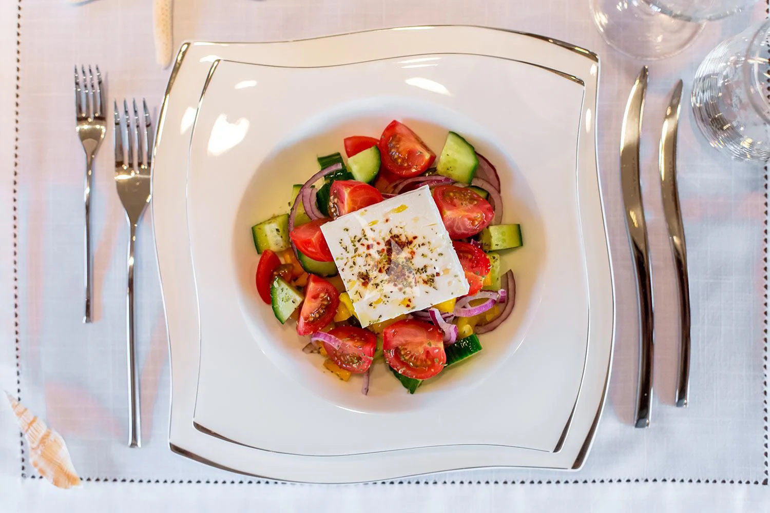 a plate of food aboard REBECCA V Yacht for Sale