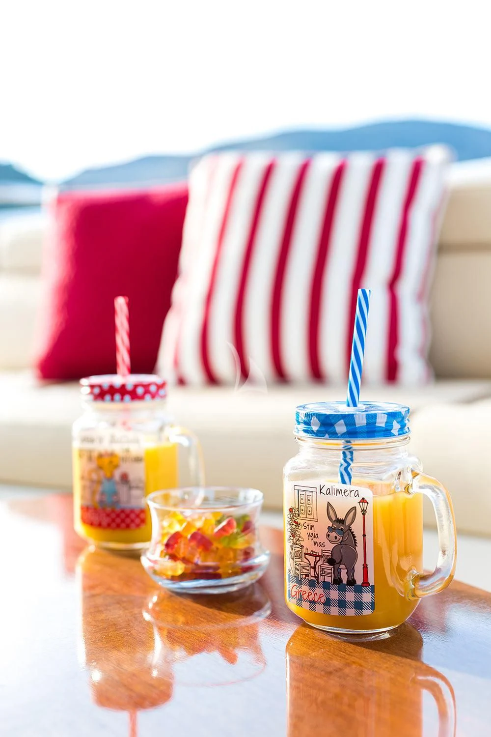 a group of colorful candles on a table aboard REBECCA V Yacht for Sale