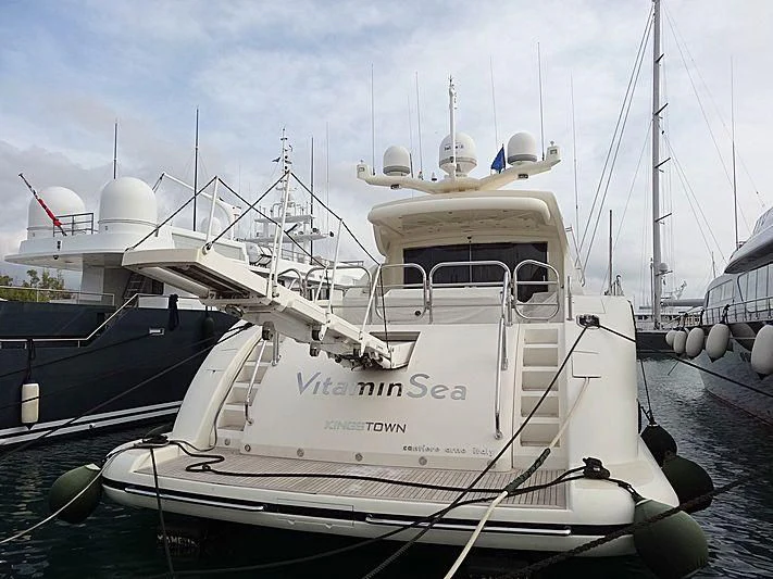a boat docked at a pier aboard VITAMIN SEA I Yacht for Sale