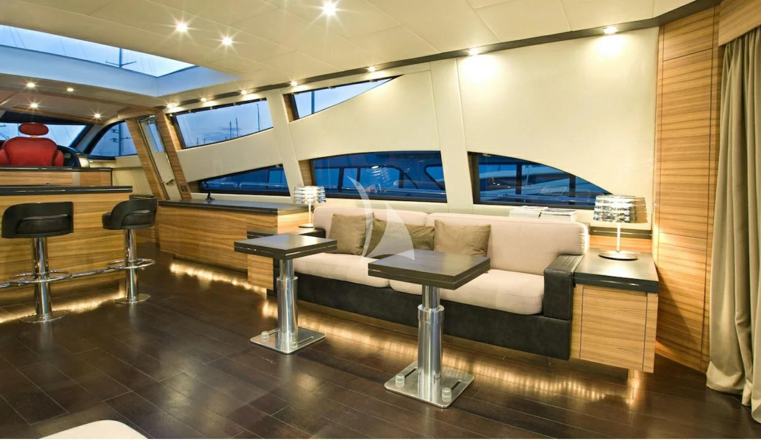 a room with a couch and a table aboard VITAMIN SEA I Yacht for Sale