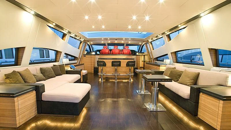 a living room with a wood floor aboard VITAMIN SEA I Yacht for Sale