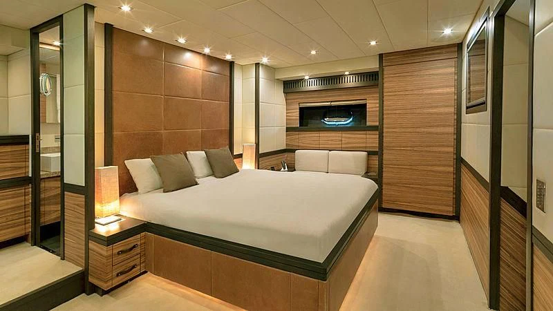 a large bed in a room aboard VITAMIN SEA I Yacht for Sale