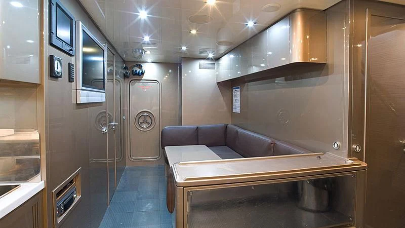 a room with a couch and a table aboard VITAMIN SEA I Yacht for Sale