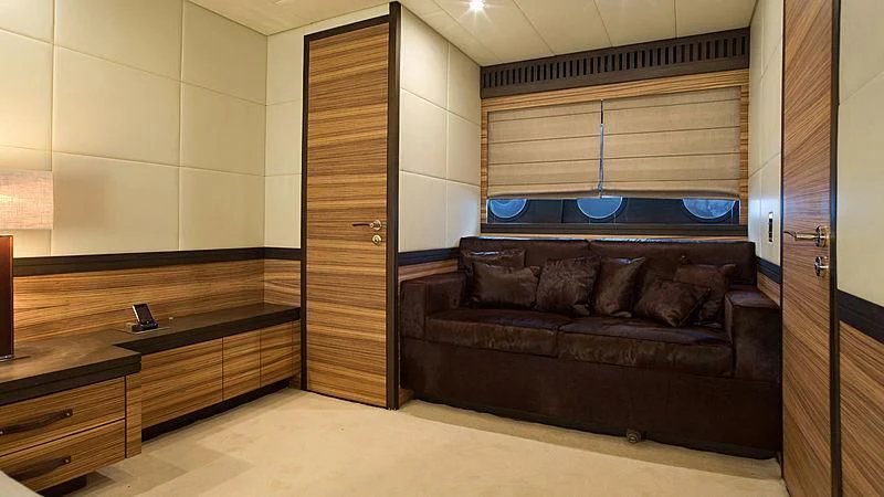 a leather couch in a room aboard VITAMIN SEA I Yacht for Sale