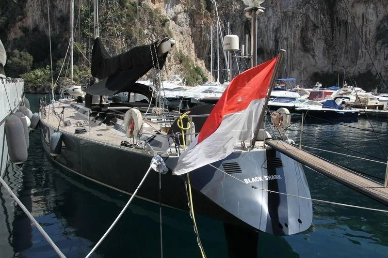a boat with a red and white sail aboard BELLE FONTAINE Yacht for Sale