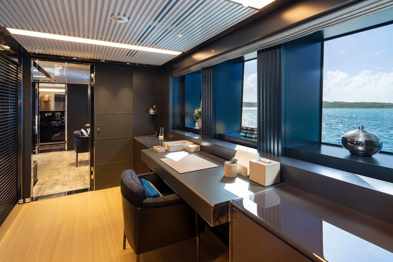 a room with a table and chairs aboard FIFTY Yacht for Charter