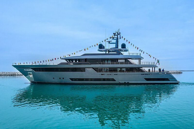 a large ship in the water aboard FIFTY Yacht for Charter