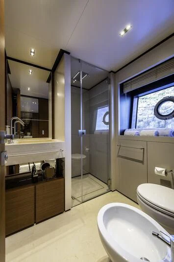 a bathroom with a sink and a toilet aboard DIANA II Yacht for Sale