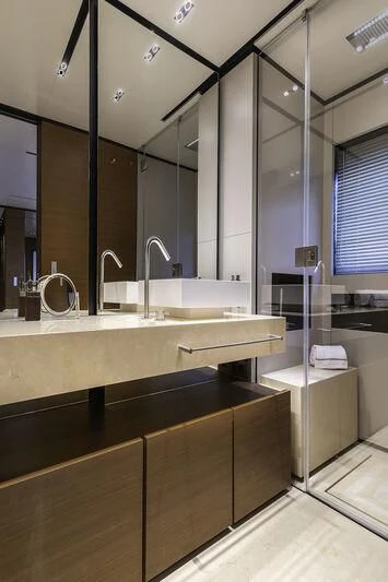 a bathroom with a large mirror aboard DIANA II Yacht for Sale