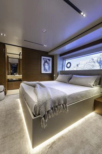 a bed in a room aboard DIANA II Yacht for Sale