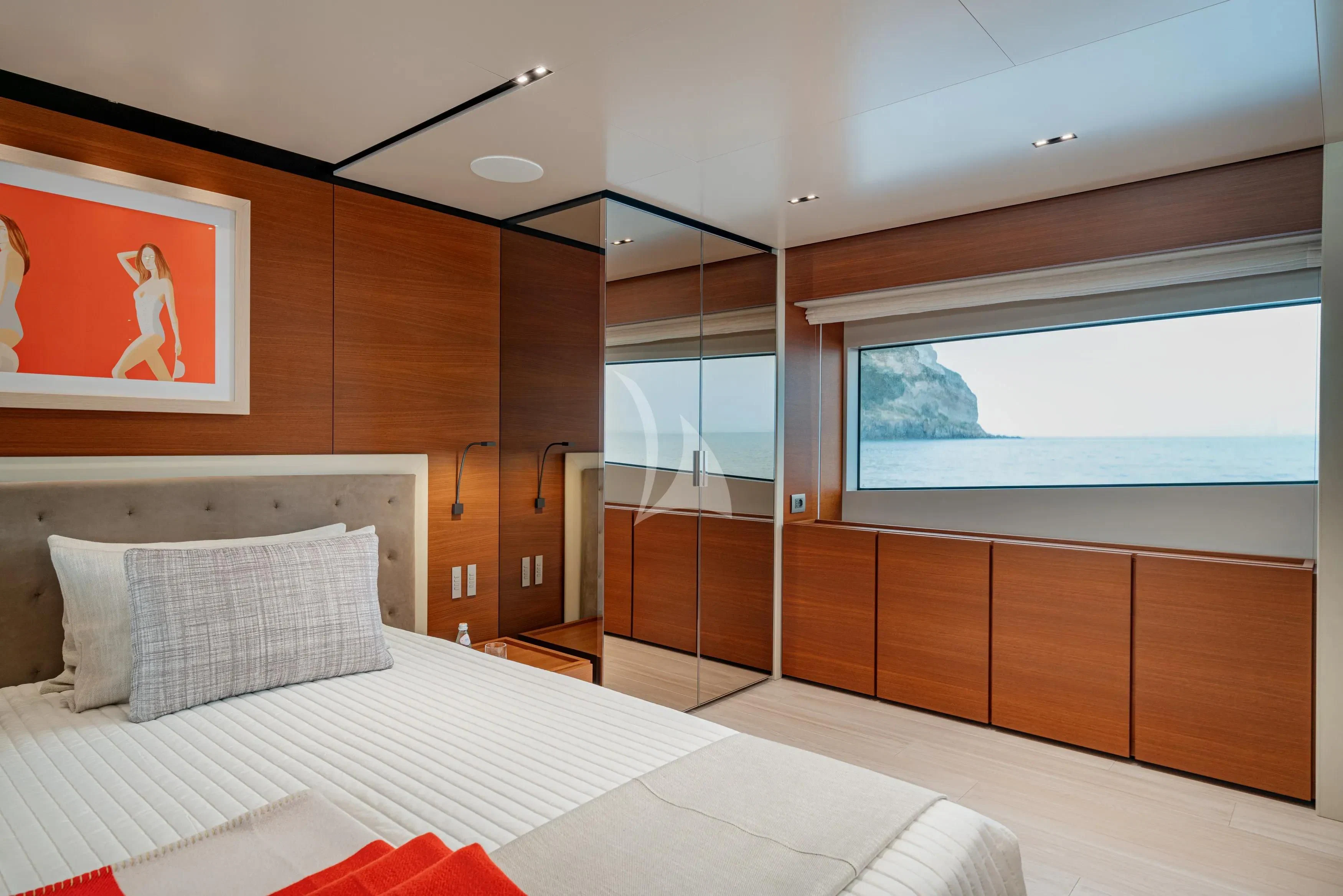 a room with a bed and a window aboard DIANA II Yacht for Sale