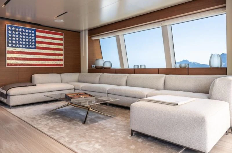 a living room with a couch and a table aboard DIANA II Yacht for Sale