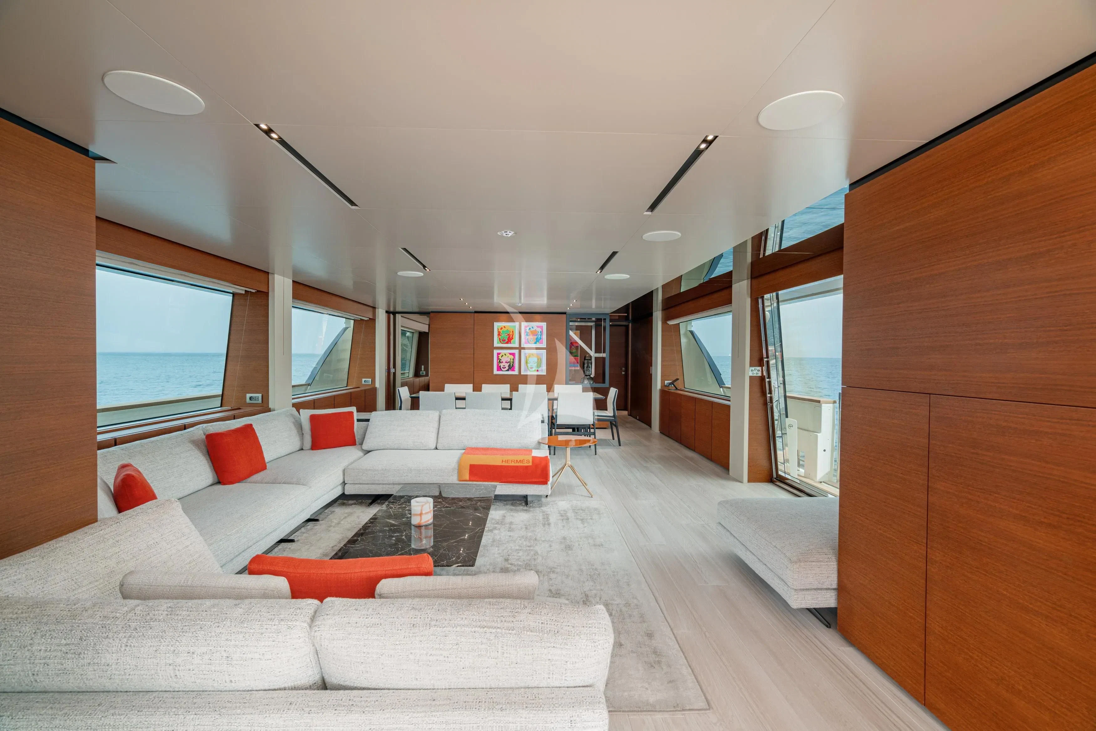 a living room with a large window aboard DIANA II Yacht for Sale