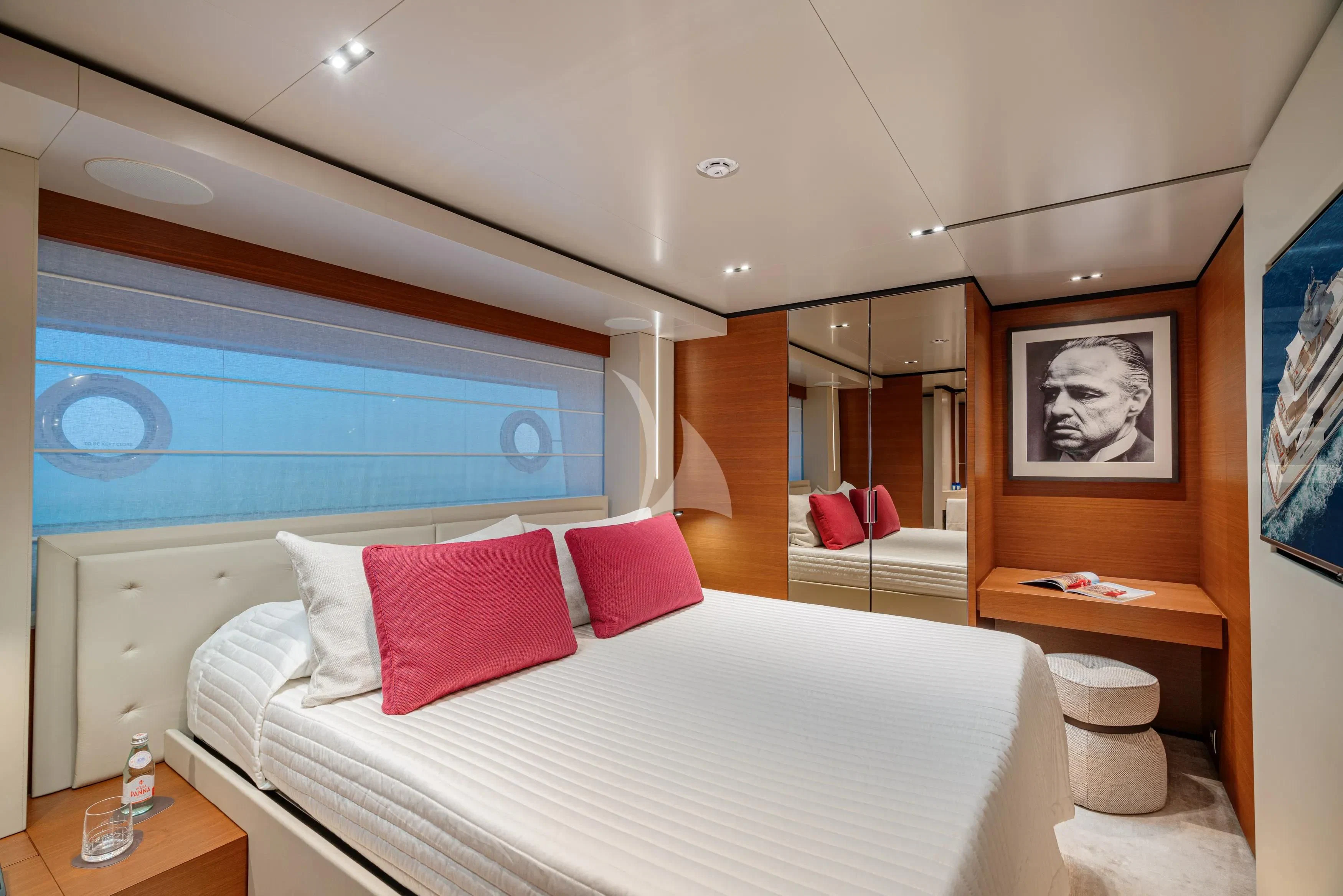 a bedroom with a large bed aboard DIANA II Yacht for Sale