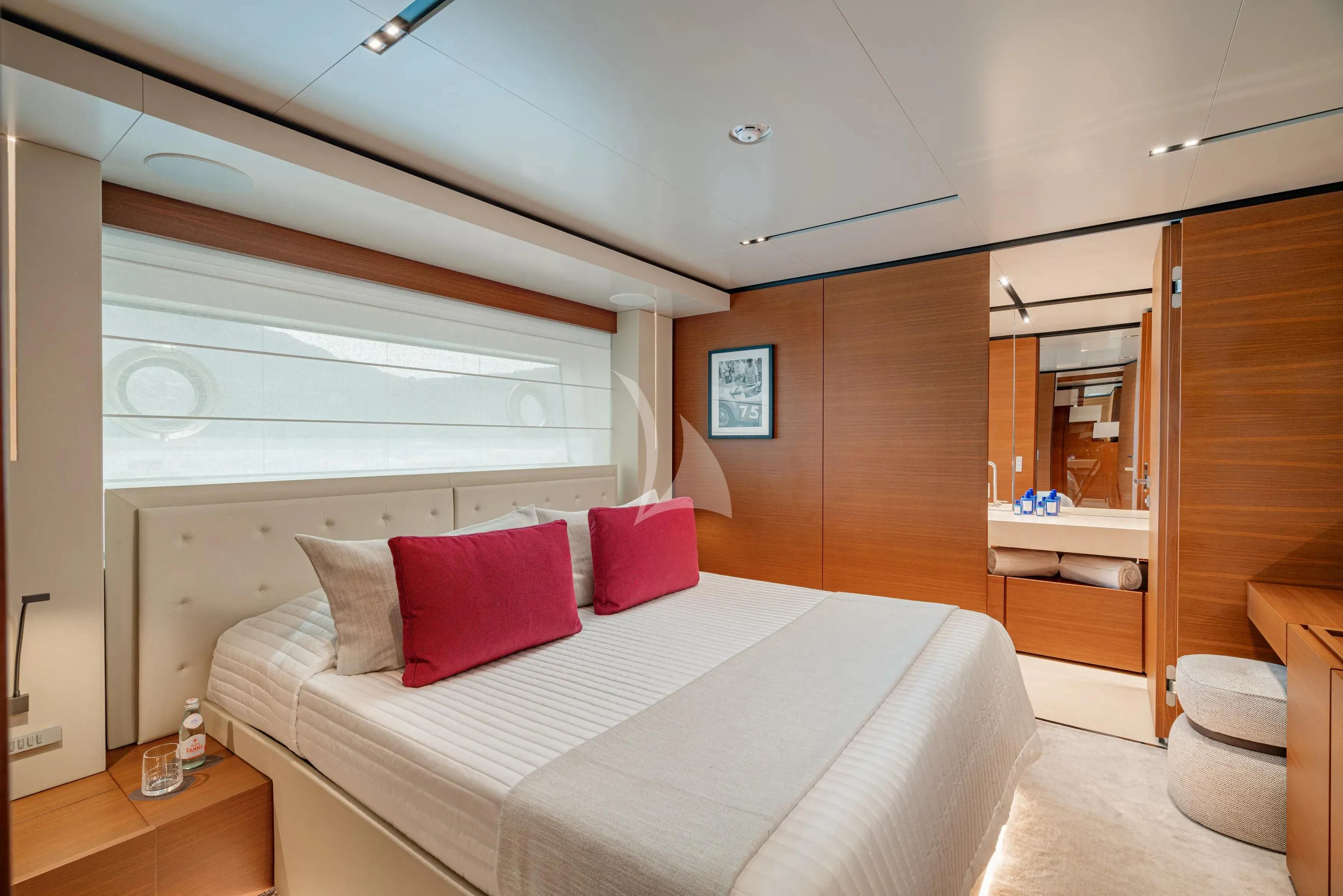 a bed in a room aboard DIANA II Yacht for Sale