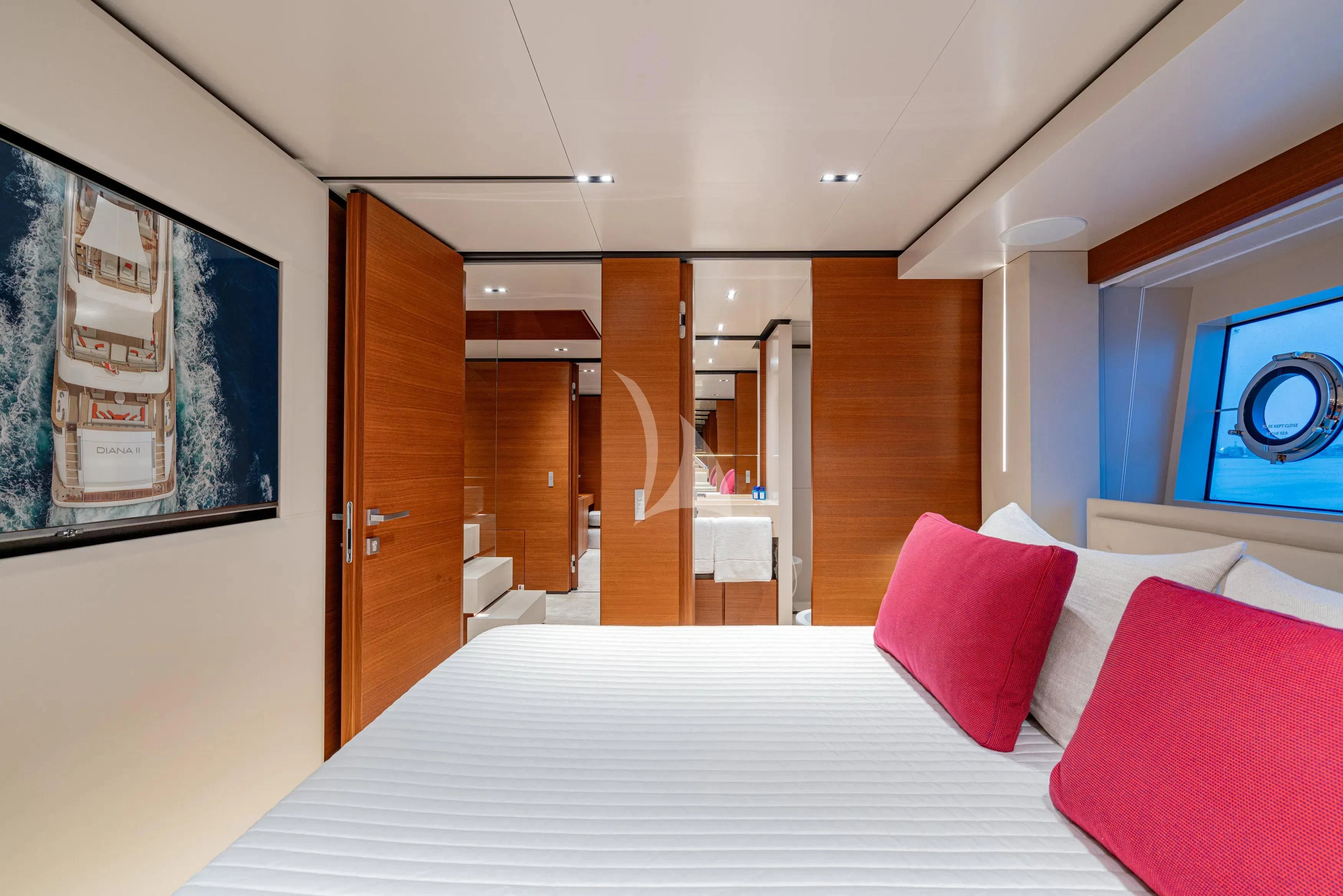 a bed in a room aboard DIANA II Yacht for Sale