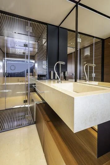 a modern bathroom with a large sink aboard DIANA II Yacht for Sale