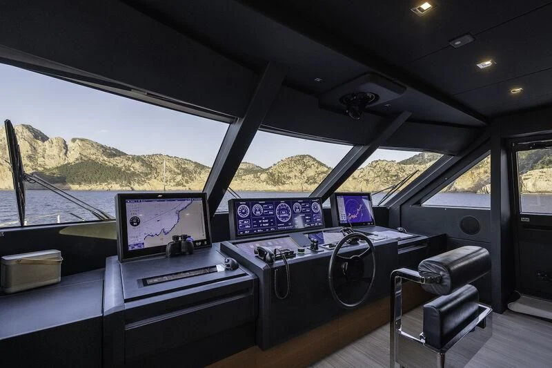 inside of a vehicle with a large window and a view of the water aboard DIANA II Yacht for Sale