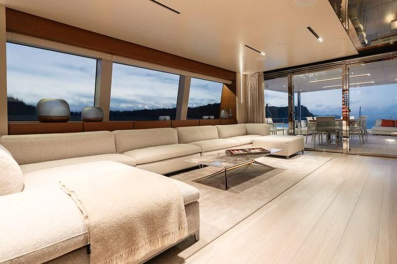 a living room with a large window aboard DIANA II Yacht for Sale