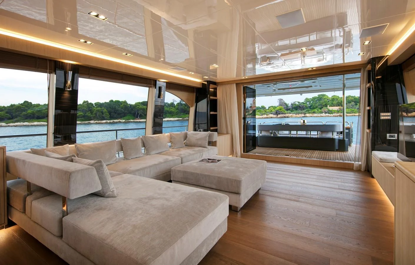 a living room with a large window aboard CANADOS 888 EVO Yacht for Sale