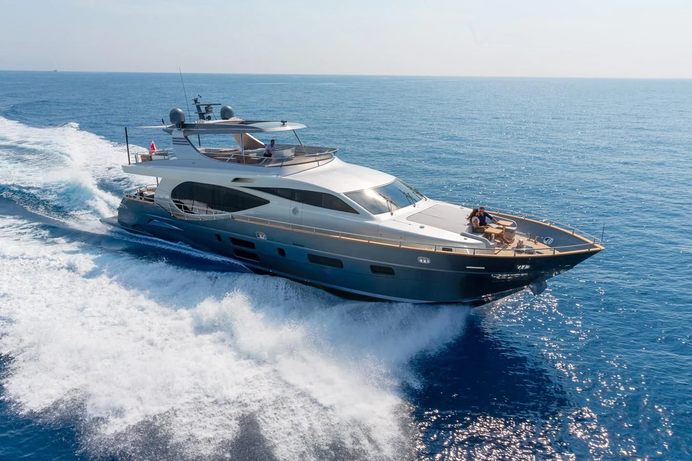 a boat on the water aboard CANADOS 888 EVO Yacht for Sale