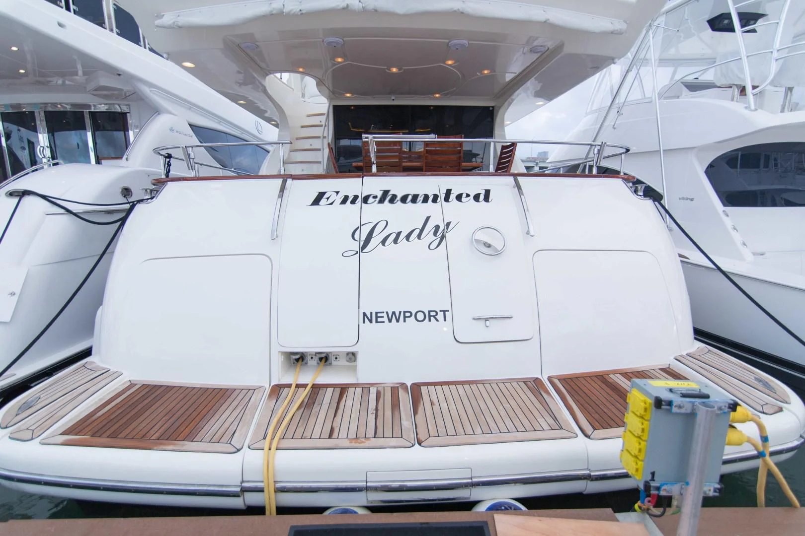 a white boat in a large room aboard ENCHANTED LADY Yacht for Sale