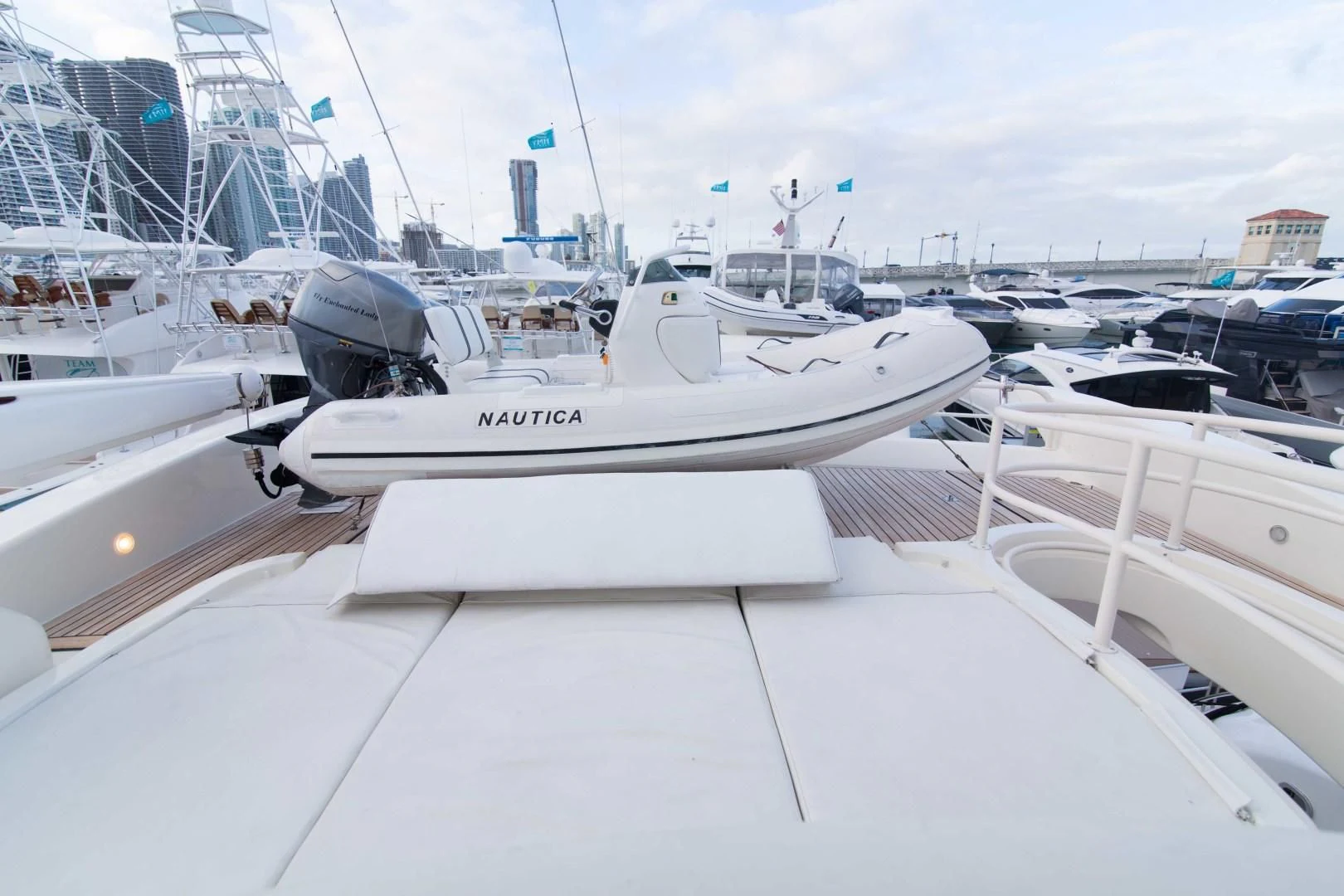 a group of boats in a harbor aboard ENCHANTED LADY Yacht for Sale