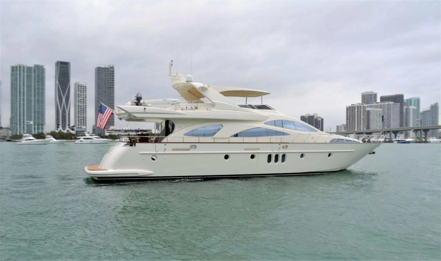 a large white boat in the water aboard ENCHANTED LADY Yacht for Sale