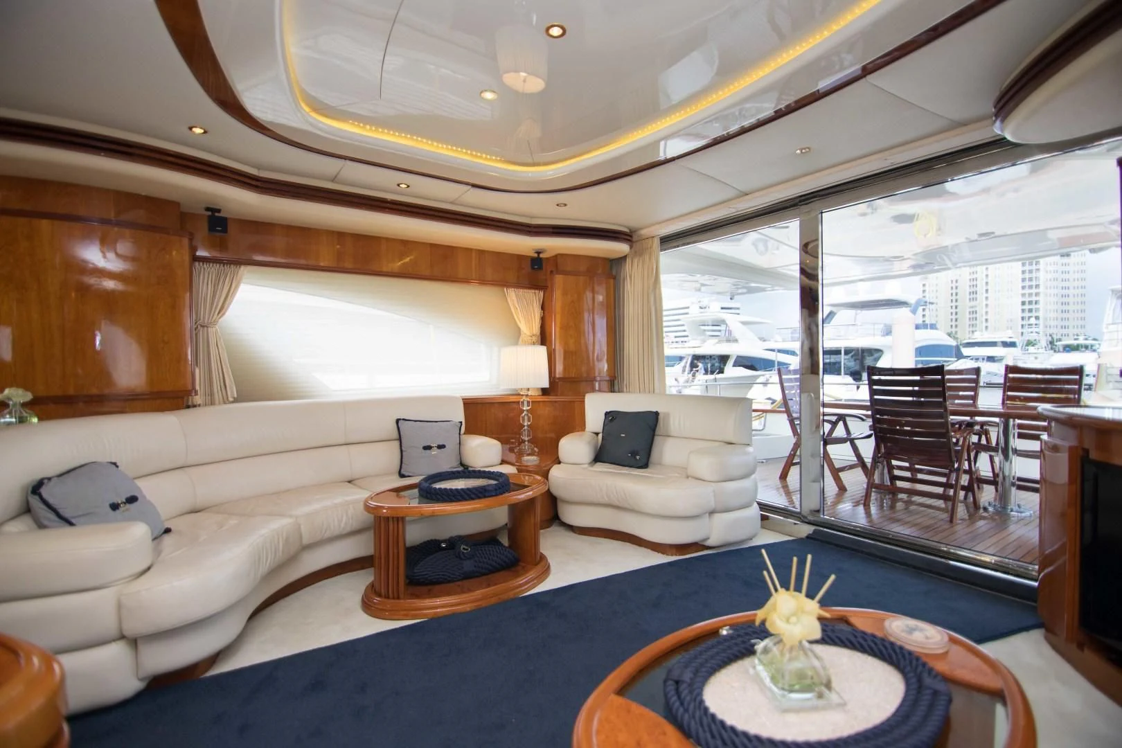 a living room with a large window aboard ENCHANTED LADY Yacht for Sale