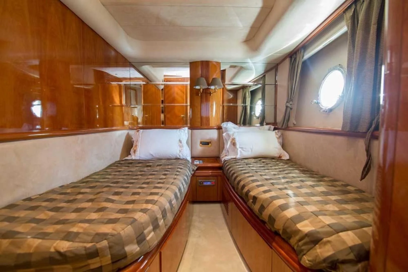 a room with two beds aboard ENCHANTED LADY Yacht for Sale