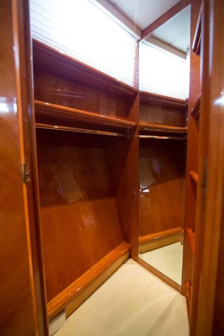 a room with a glass door aboard ENCHANTED LADY Yacht for Sale