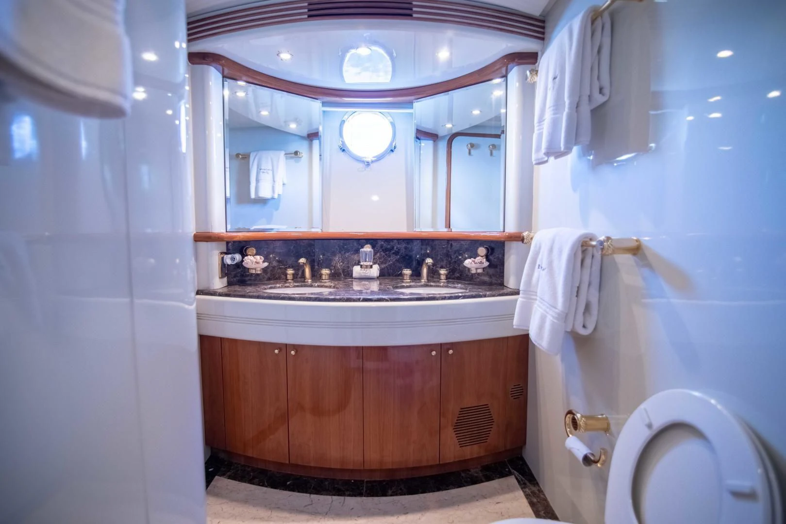 a bathroom with a sink and a bathtub aboard ENCHANTED LADY Yacht for Sale