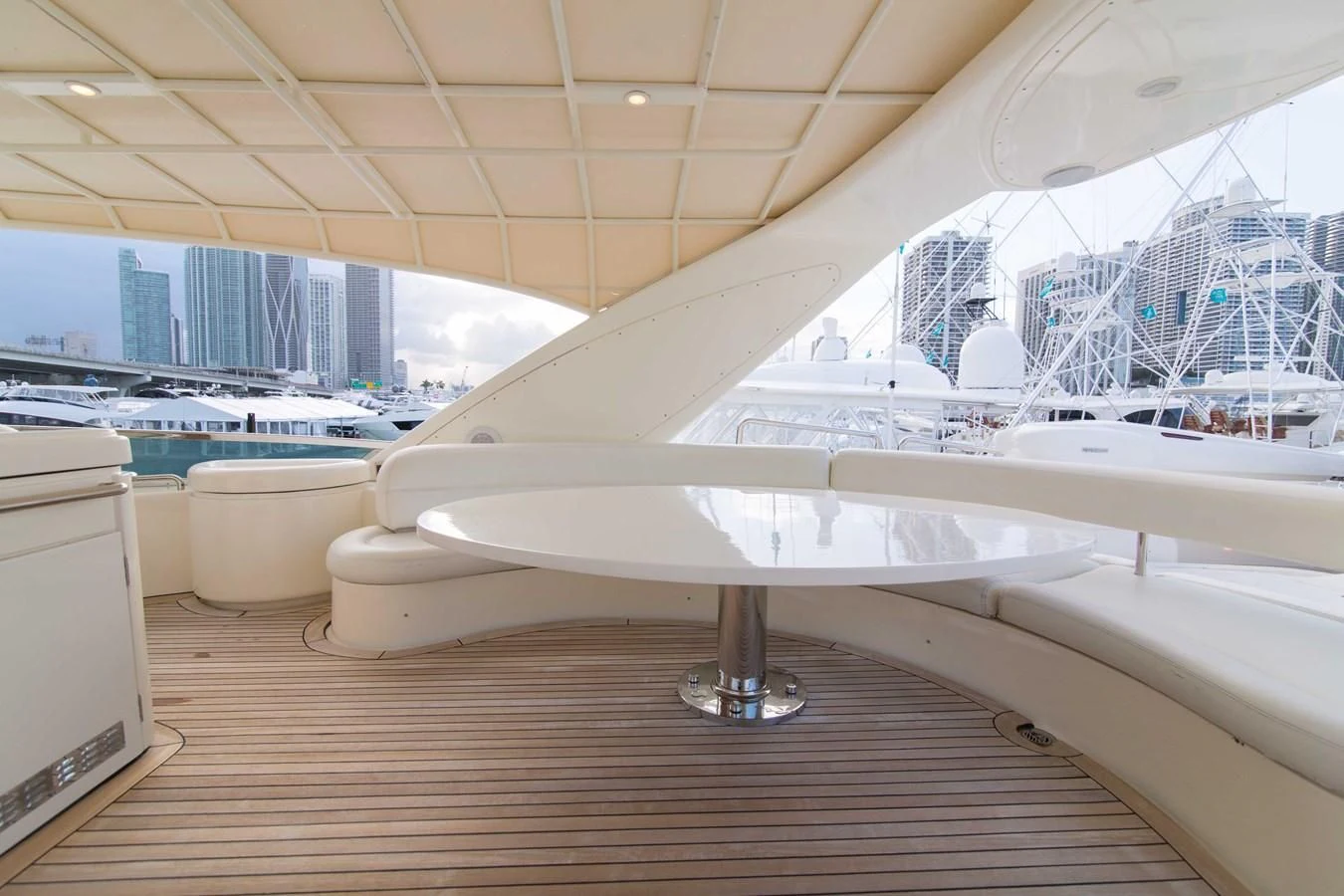 a large white boat in a large room with a large window aboard ENCHANTED LADY Yacht for Sale