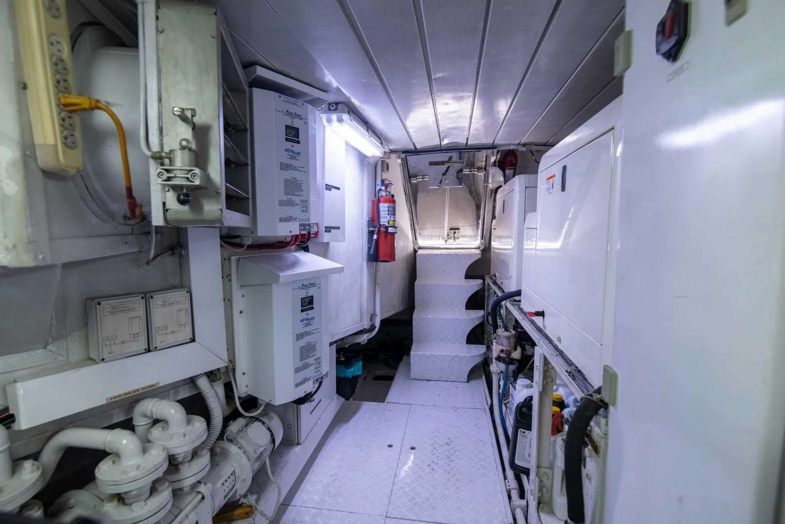 a room with white pipes aboard ENCHANTED LADY Yacht for Sale