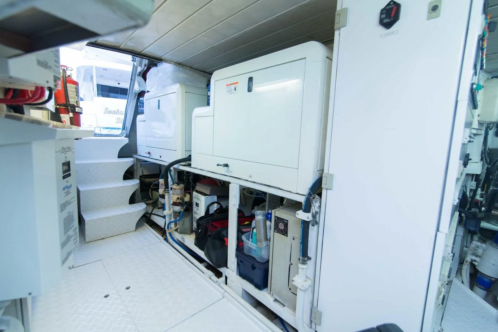 a room with white cabinets aboard ENCHANTED LADY Yacht for Sale